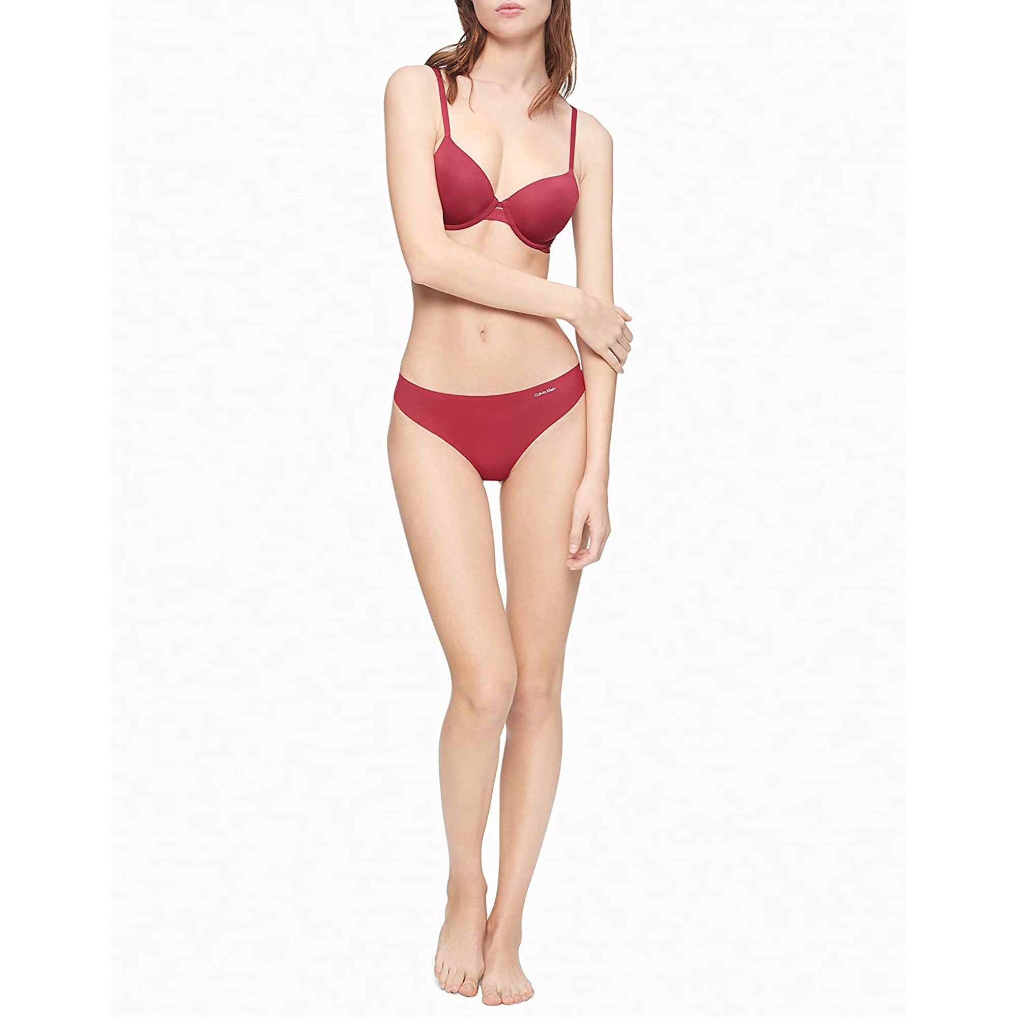 Calvin Klein Women's Invisibles Thong in Rebellious, Size Large