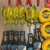 28-Piece Wholesale Tool Lot – Box Cutters, Wire Cutters, Measuring Tapes, Phillips Screwdrivers, Needle Nose Pliers